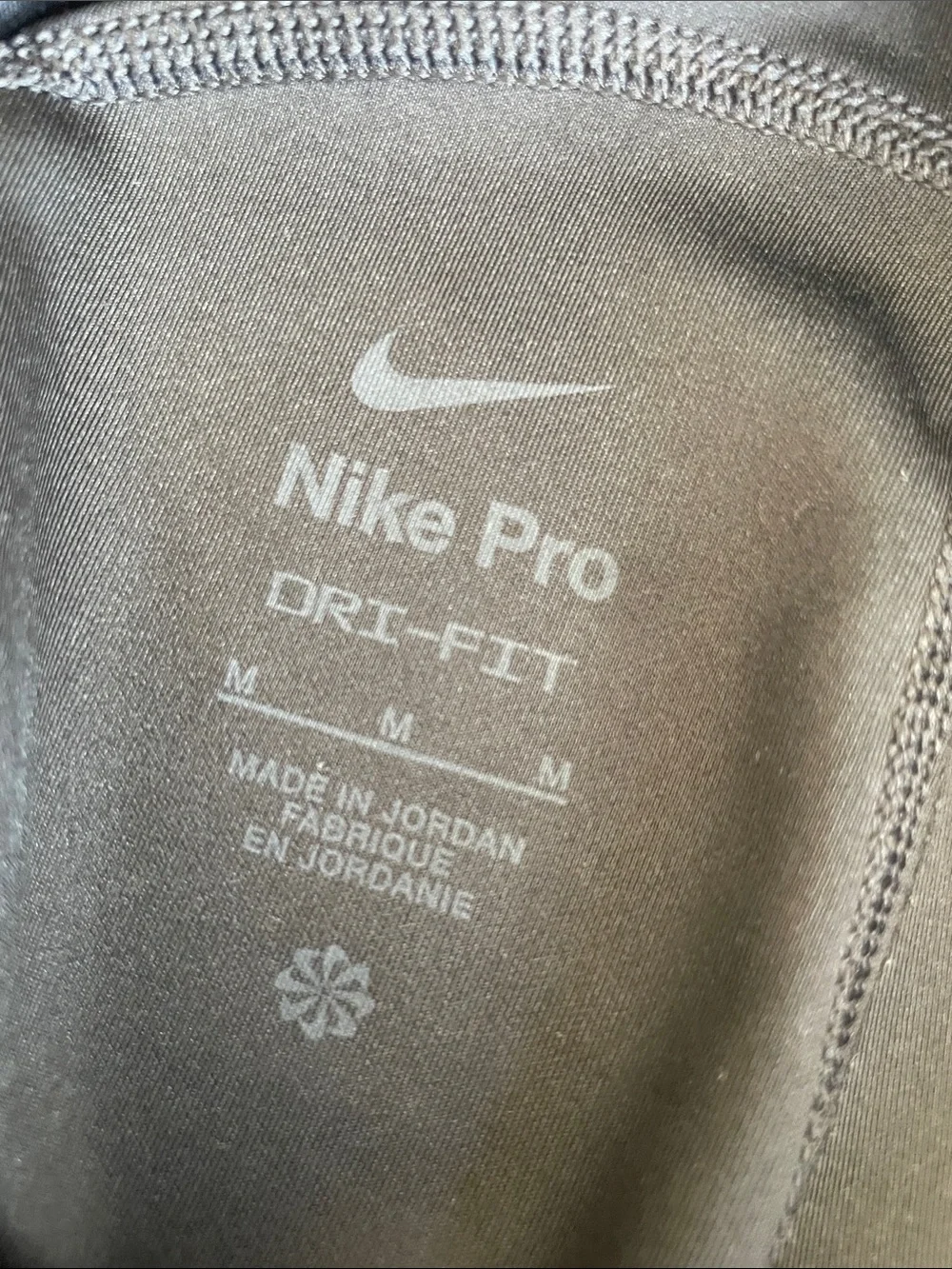 Nike Black Compression Shorts with White Swoosh